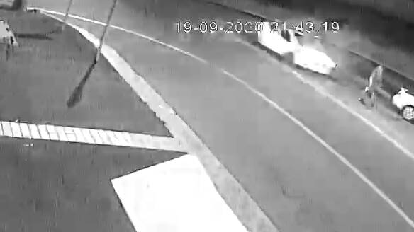CCTV footage shows the pedestrian stepping into the path of the white car, Saturday night. Picture: supplied. 