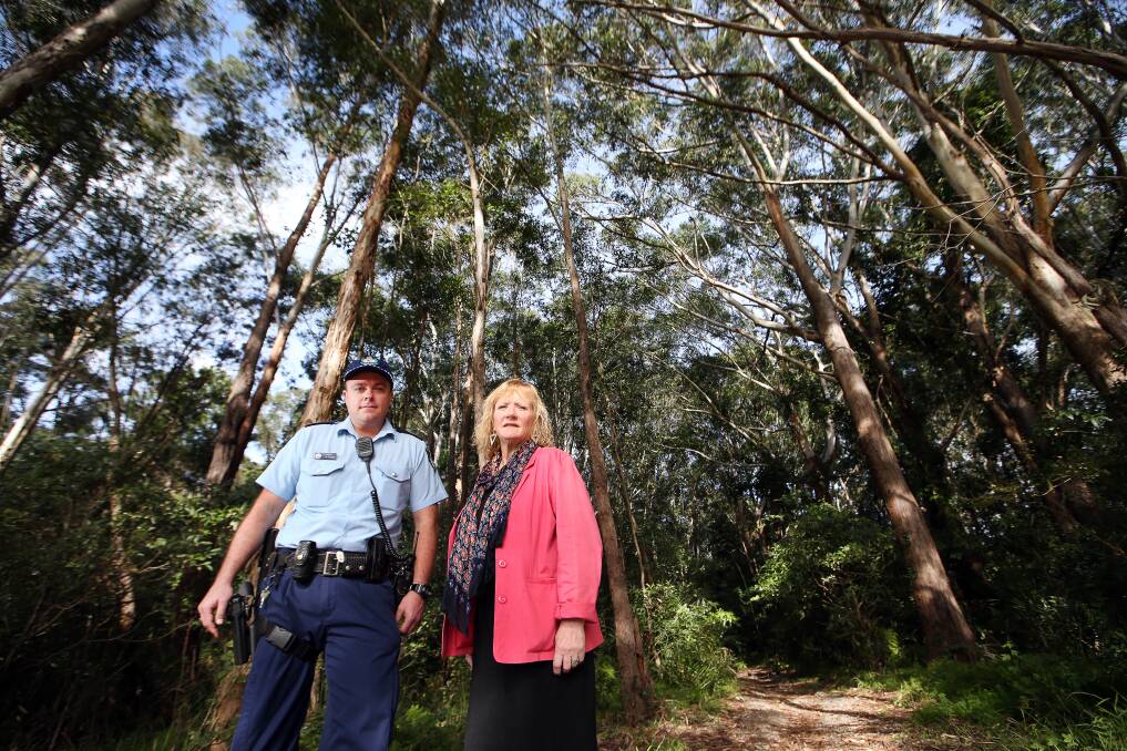 DANGER ZONE: Marianne Saliba and Sergeant Lee Paterson are calling on members of the public to report unregistered trail bike riders in area hotspots including Blackbutt Forest Reserve. Picture: Sylvia Liber