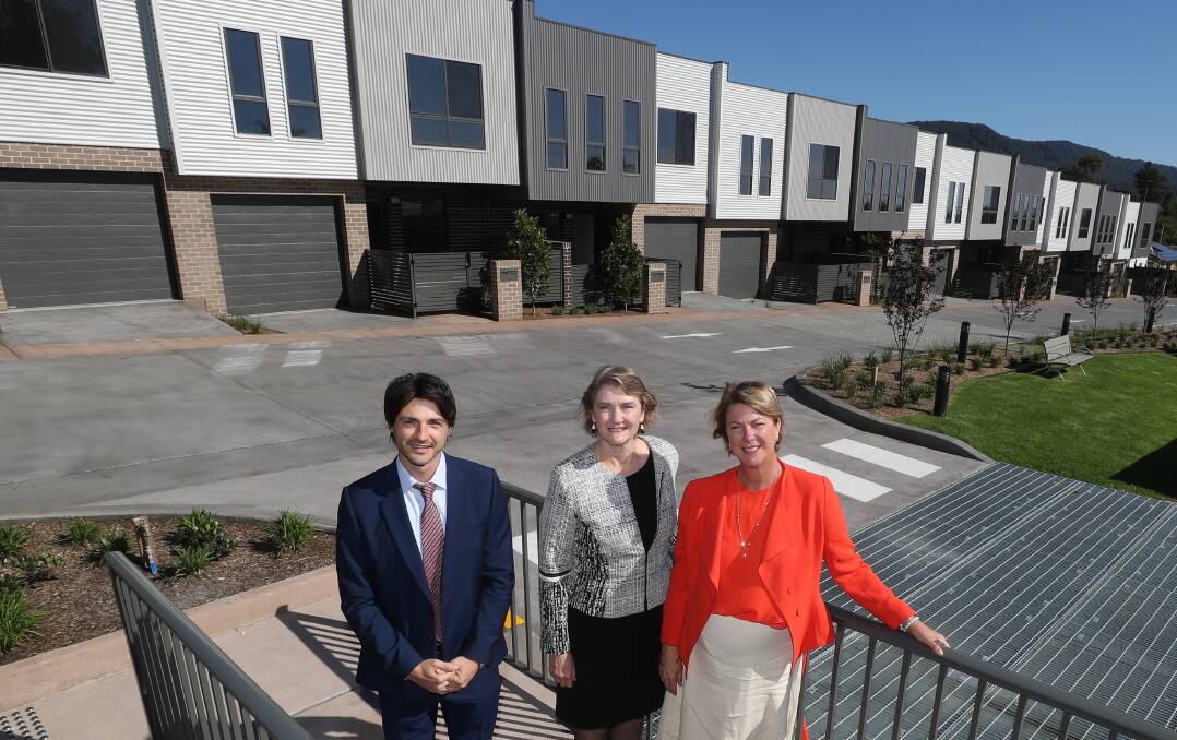 Director of Traders in Purple Charlie Daoud, Housing Trust CEO Michele Adair and Housing Minister Melinda Pavey at Monday's opening in Corrimal. Picture: Robert Peet 