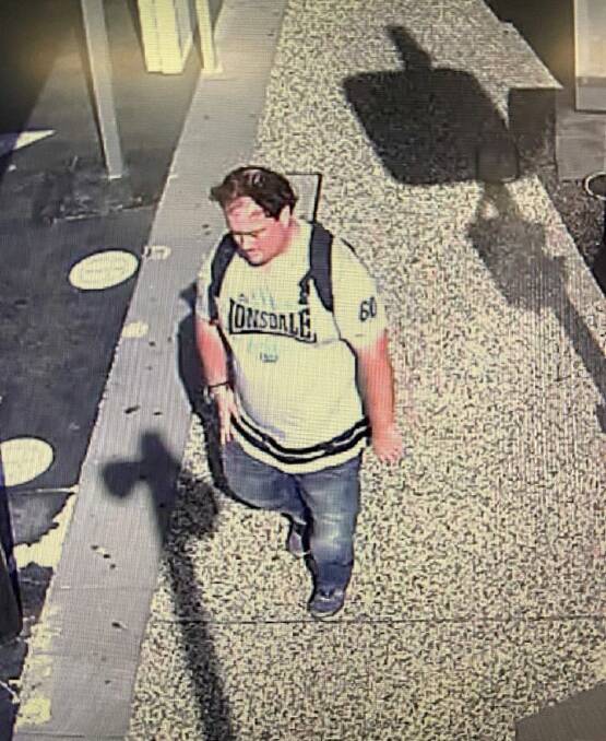 Police believe the pictured man may be able to assist with their inquiries. In an image released by police he is wearing a light-coloured Lonsdale t-shirt, blue jeans, blue and white running shoes and a black backpack. Picture: NSW Police 