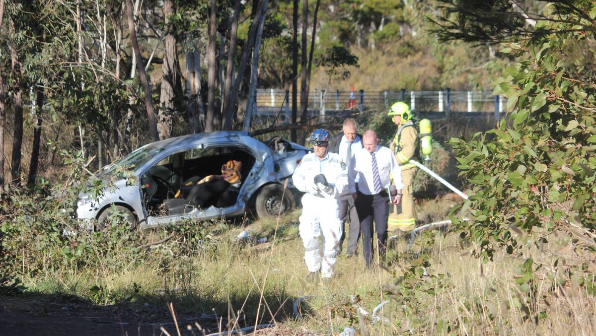 A car carrying the elderly couple came to rest off the roadway. Picture: Goulburn Post