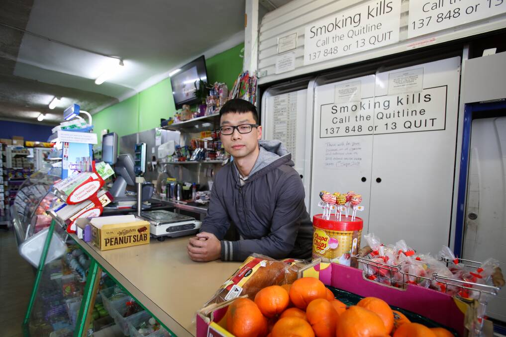 Father-of-two Tony Hong works seven days a week at his Balgownie business, which has now suffered about $8000 in losses. Picture: Adam McLean