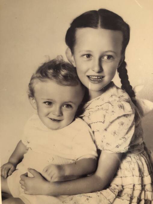 Family bonds: Gina Andrews' mother Sue Andrews (nee Gowlland) with her baby brother John, known as Ricky.