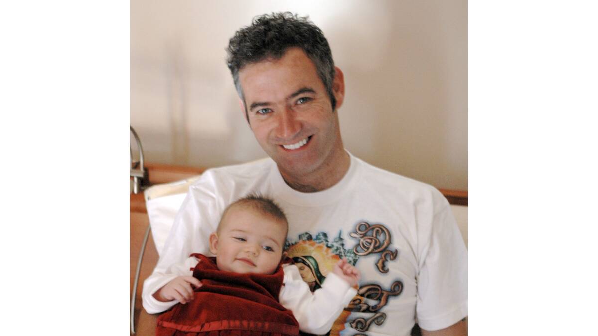 Blue Wiggle Anthony Field with his daughter Lucia as a baby. Picture supplied.