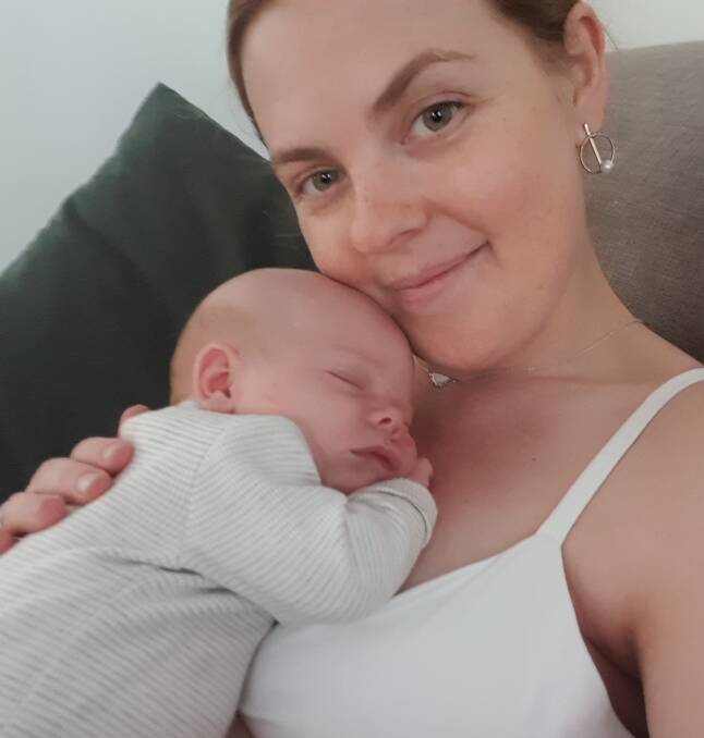 Allana Robson, with eight-week-old Eleanor, said the government had shown during the pandemic it could provide free childcare and should "reconsider and make it a permanent thing". 