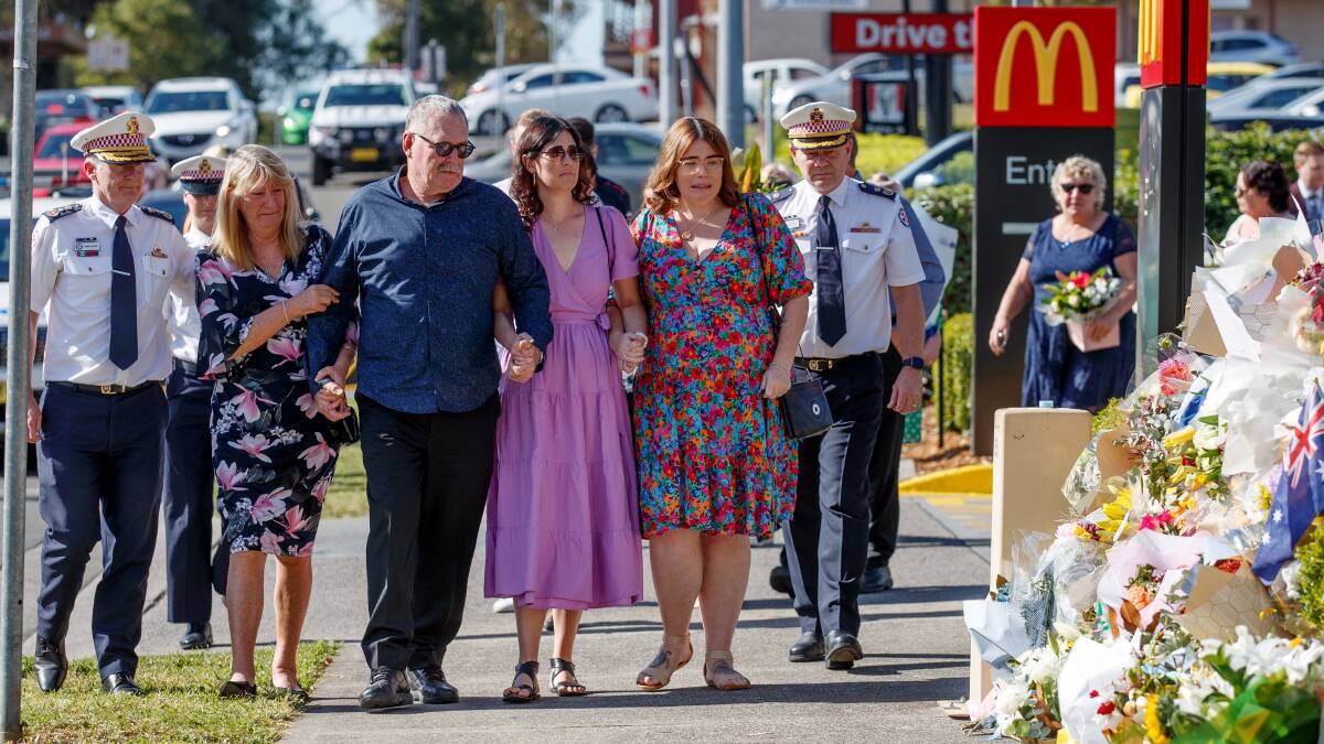 Steven Tougher's family visit the site where he was killed. Picture by AAP.