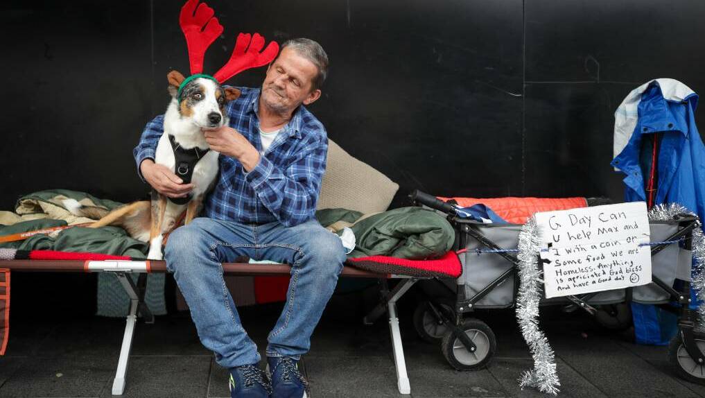 CHRISTMAS: Charlie White with his dog Max. Charlie has been sleeping rough in Wollongong for about four months. Picture: Adam McLean