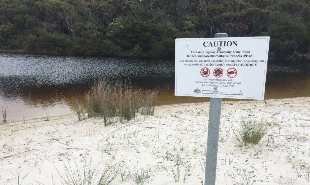 Signs warning of contamination in creeks and lagoons in Jervis Bay were erected after PFAS was identified. Picture supplied