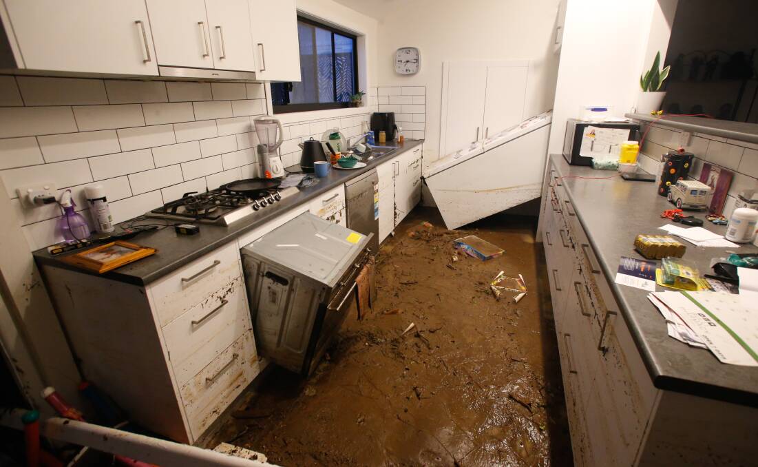 Gary and Browyn Hart's house had a river of mud flow through it, destroying everything in it's path. Picture by Anna Warr