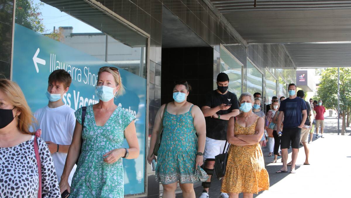 People waiting to be vaccinated at Wollongong's vaccination centre. Picture: Sylvia Liber