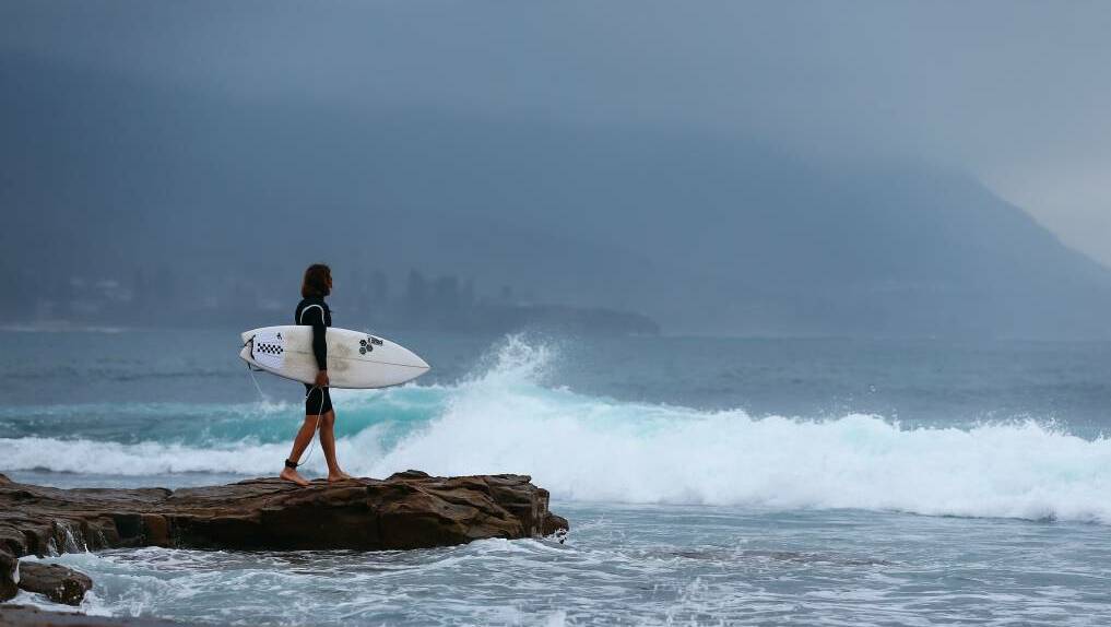 A surfer at Sandon Point on Sunday. Picture: Wesley Lonergan