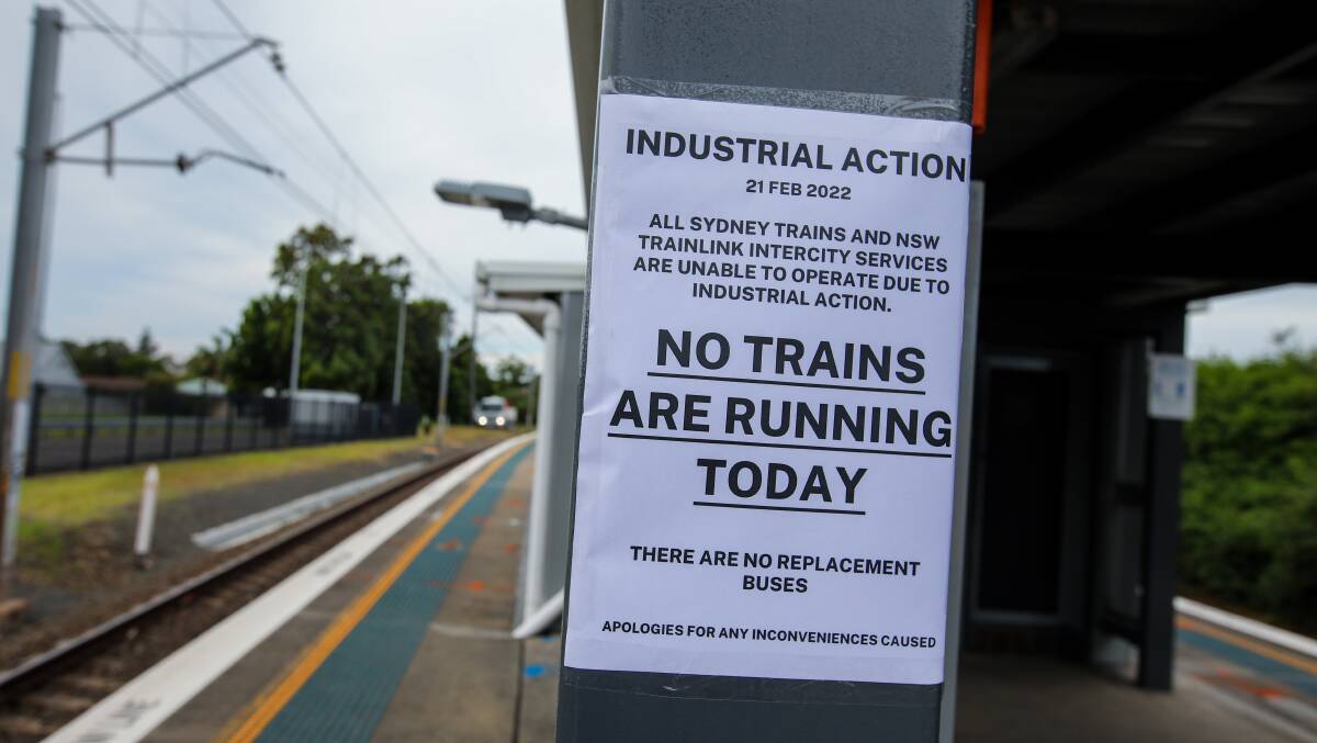 Signs at Bellambi Train Station. Picture: Wesley Lonergan