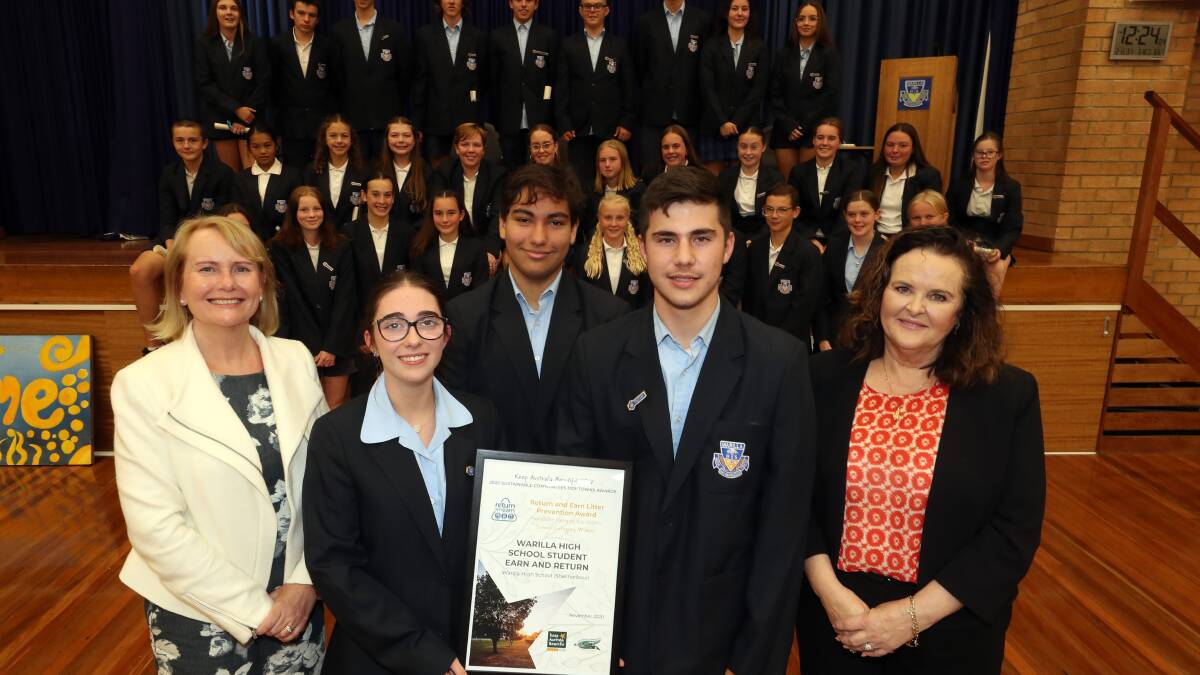 Shellharbour City's Young Citizen of the Year Ryan Scheu (fourth from left) in March 2021 after receiving an award for litter prevention. Picture: Robert Peet