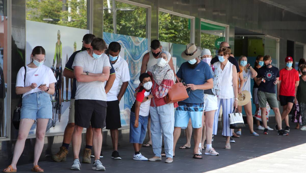 Queues outside Wollongong Vaccination Centre on Tuesday. Picture: Sylvia Liber