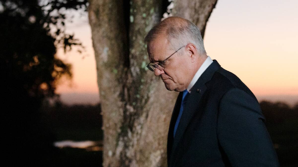 Scott Morrison looking thoughtful at dawn on the first day of the 2022 election trail at Coolangatta Estate winery near Shoalhaven Heads. Picture: James Croucher