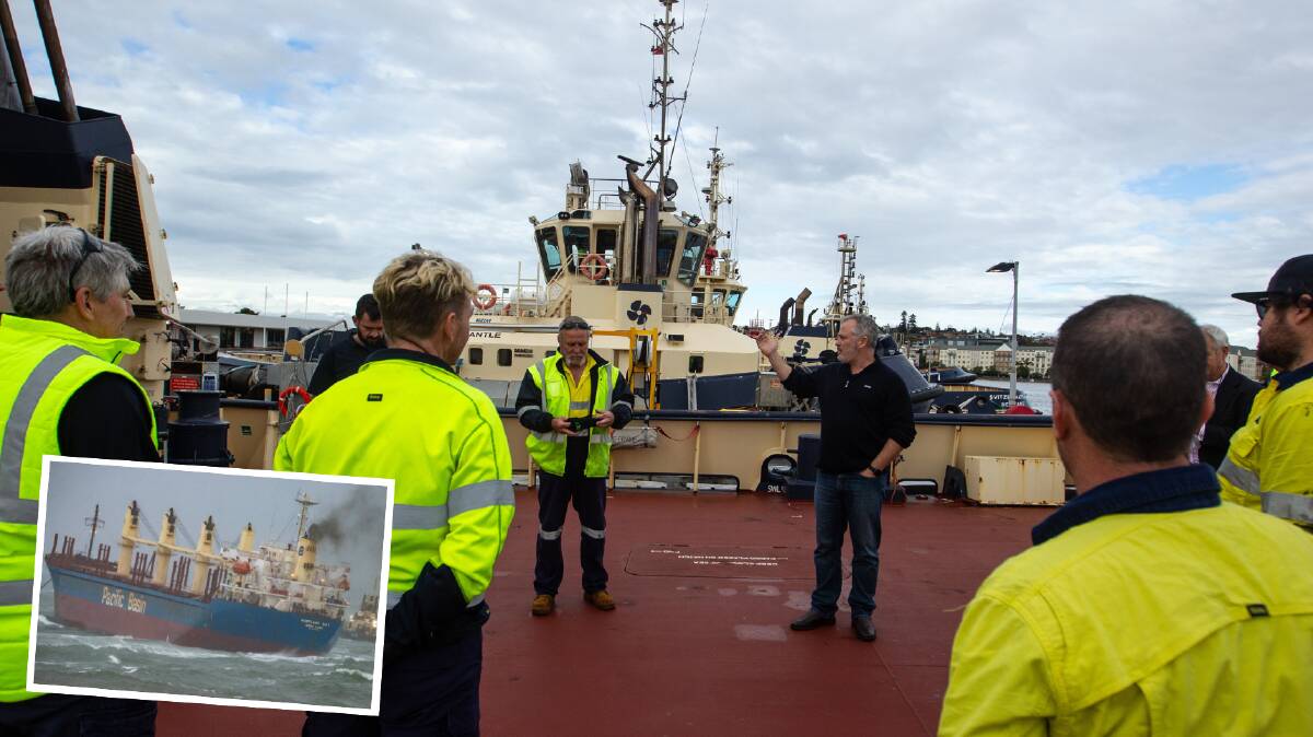 Geophrey Gavin, Svitzer's Newcastle Port and Operations Manager, speaks with the crew of the "Svitzer Glenrock". Picture: Marina Neil. Inset the Portland Bay. Picture: Mark Sundin