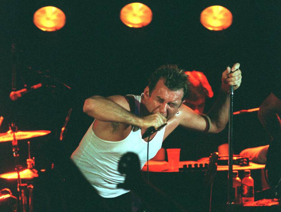 ANTHEMIC: Does it mean more than heaps of people singing along? Jimmy Barnes frons Cold Chisel in Newcastle, 1998.