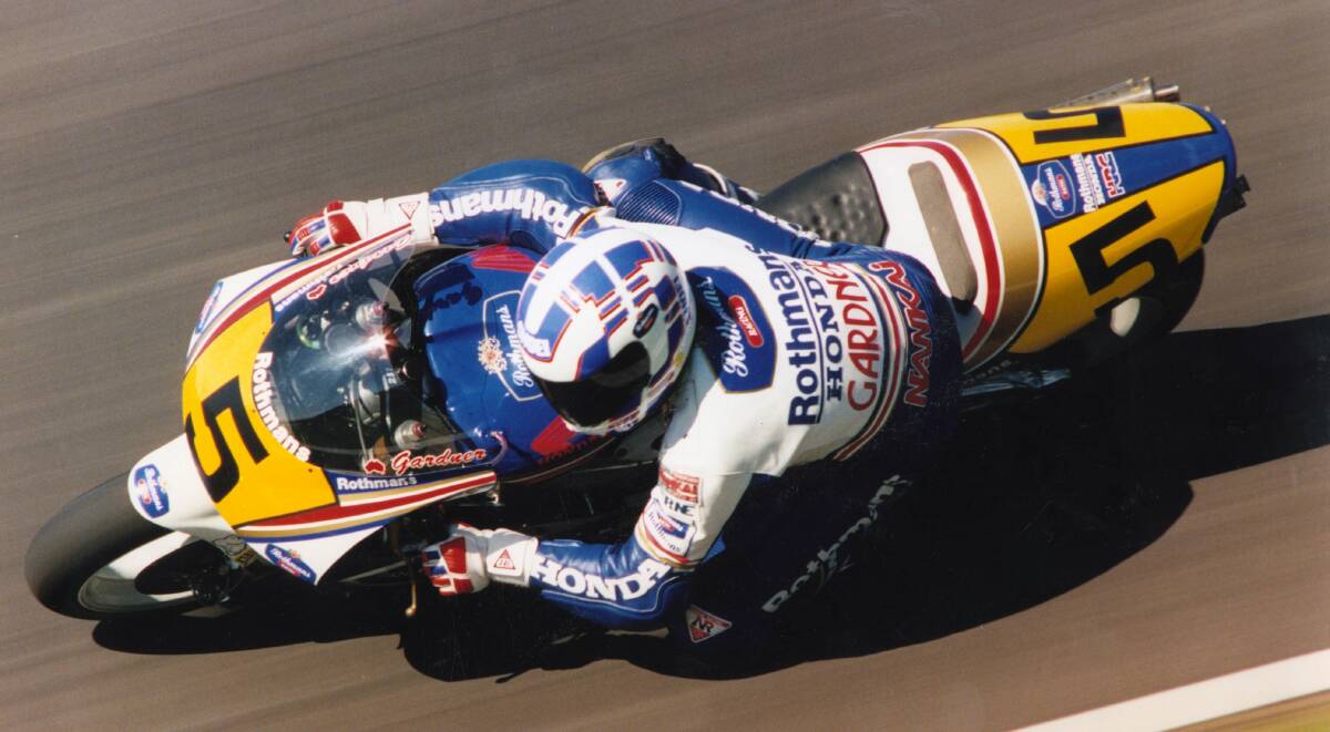 Winner: Wayne Gardner leans into a corner on his way to winning the inaugural Grand Prix at Phillip Island in 1989. Picture: Ken Robertson