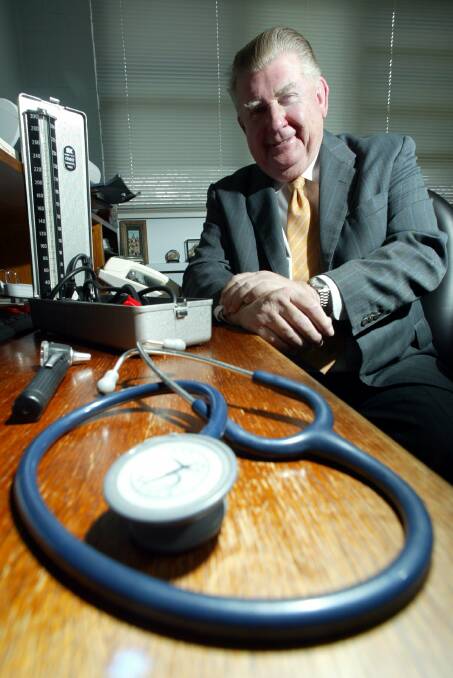Dr Turner of Wollongong pictured in January 2005 on receipt of his OAM for services to general practice. Picture: Ken Robertson