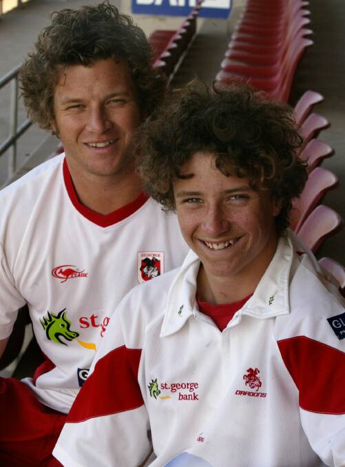 Back in red and white: A 13-year-old Korbin Sims with older brother Ashton in 2005. Picture: Wayne Venables. 