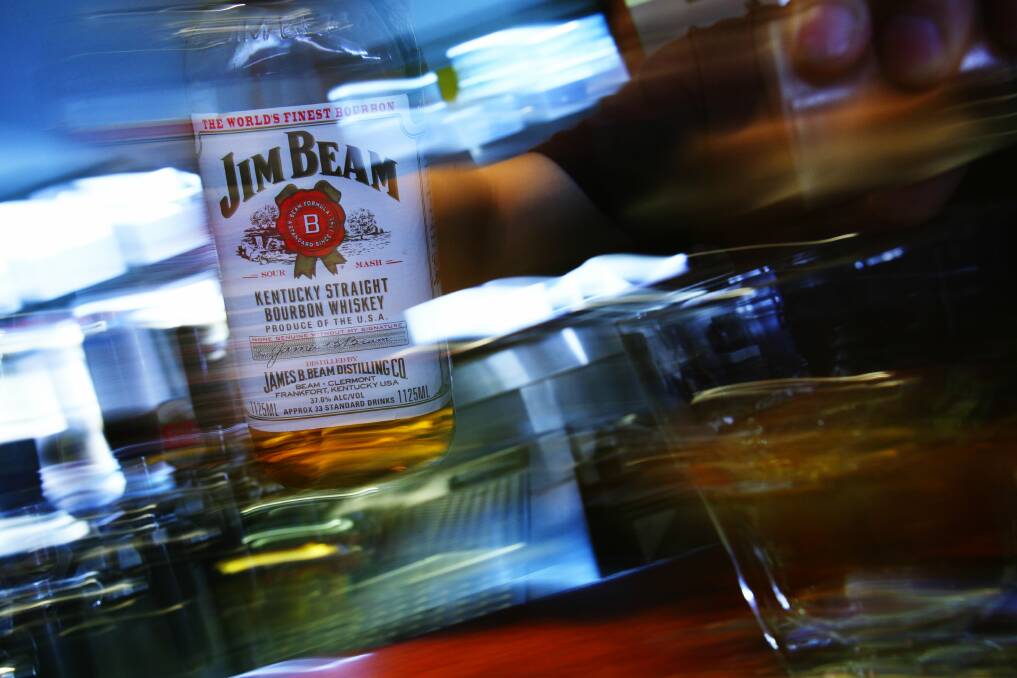 Police have charged Robert Darrell Booth over the alleged theft of bottle of Jim Beam and other spirits.
