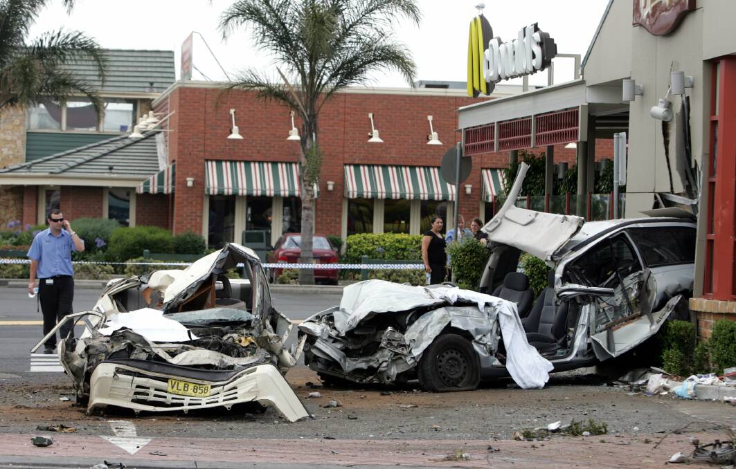 The destruction in December 2006 after an overloaded truck ploughed through the McDonald's car park. Picture: Orlando Chiodo
