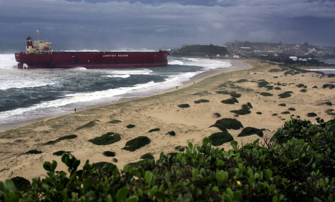 The cargo ship Pasha Bulker ran aground in Newcastle in 2007. In bad weather ships at Port Kembla are sent out to sea to stop this happening. Picture: Simone de Peak