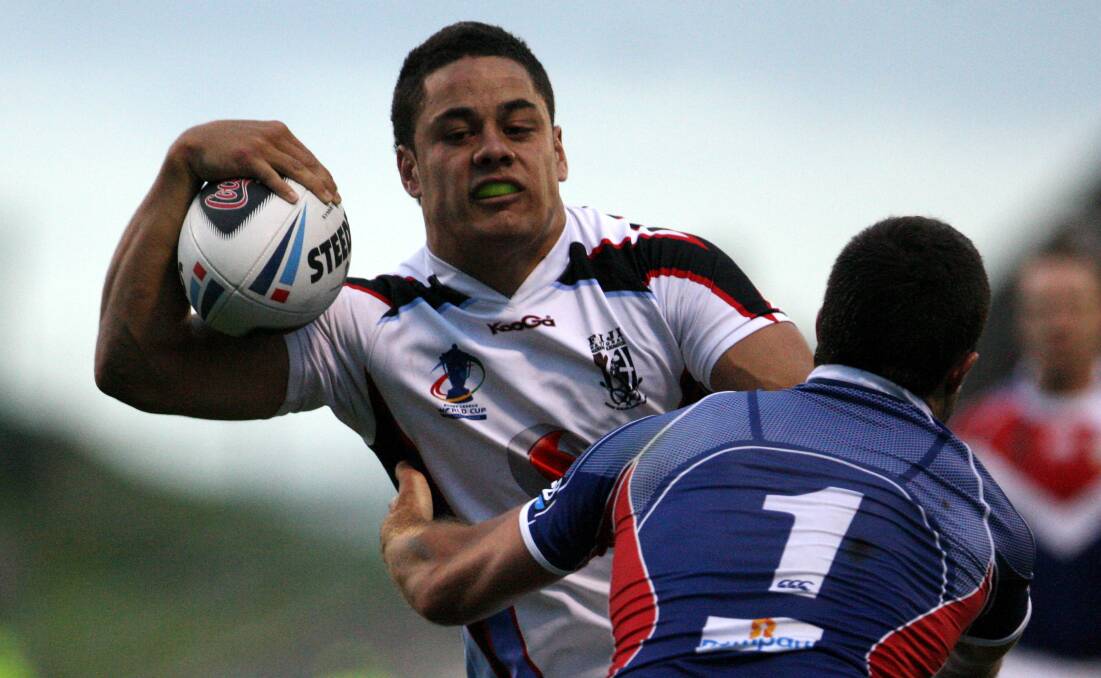 Take me on: Jarryd Hayne plays for Fiji against France at WIN Stadium in 2008. Picture: Greg Totman