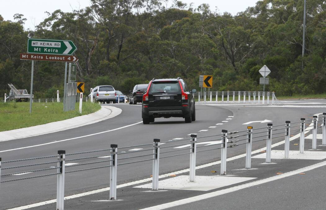 Picton Road needs more overtaking lanes to improve safety and travel times, according to Infrastructure Australia. Picture: Robert Peet