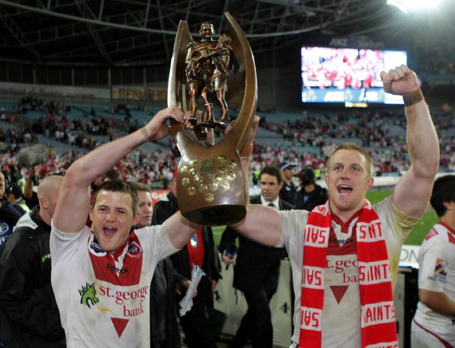 Flashback: Brett Morris with Ben Creagh and the 2010 NRL premiership trophy. Picture: Andy Zakeli