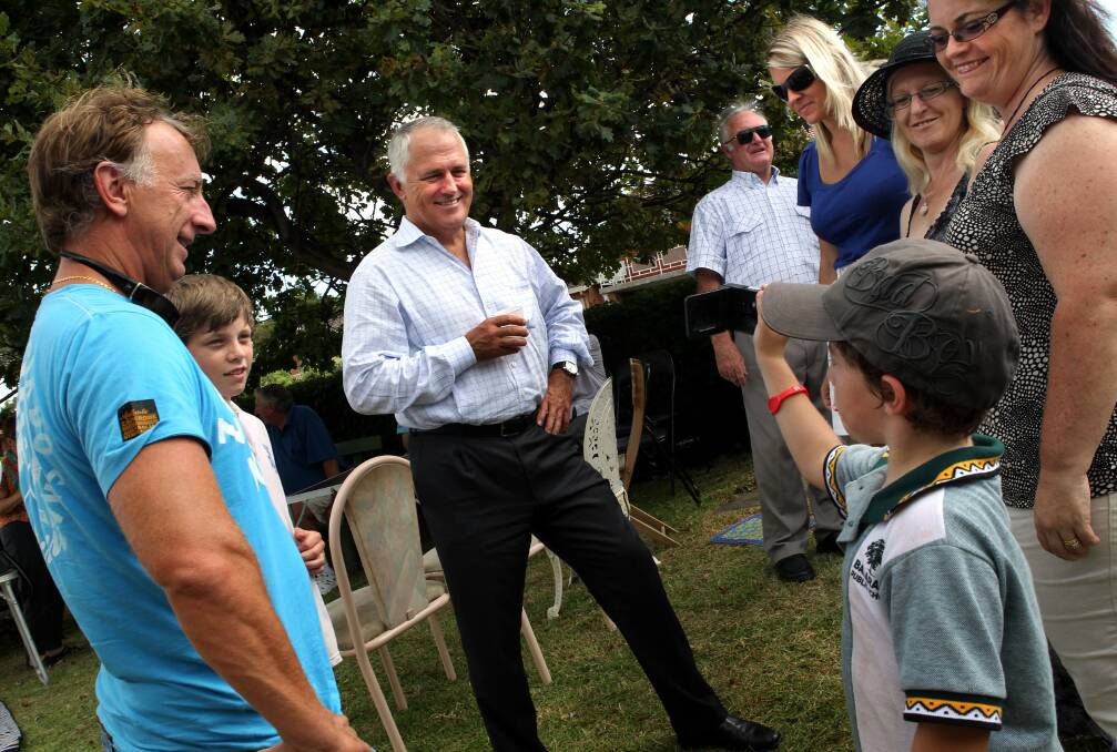 ON THE RECORD: Malcolm Turnbull being video taped by 8 year old Nathan Marsh at the 2011 barbecue at Barrack Heights.