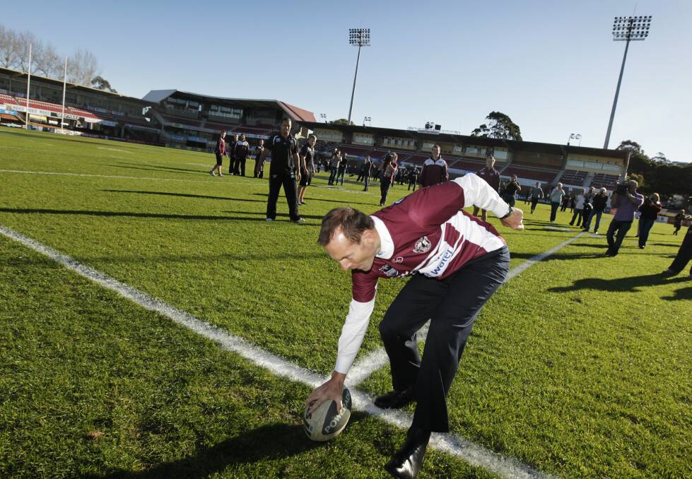 HYPOCRITE: Tony Abbott decked out in Manly gear. Picture: Glen McCurtayne 
