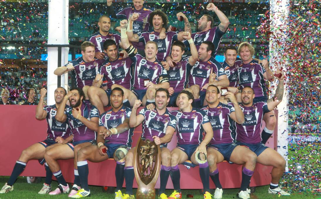 Storm front: Gareth Widdop (middle row, fourth from left) celebrates in 2012. Picture: Brendan Esposito