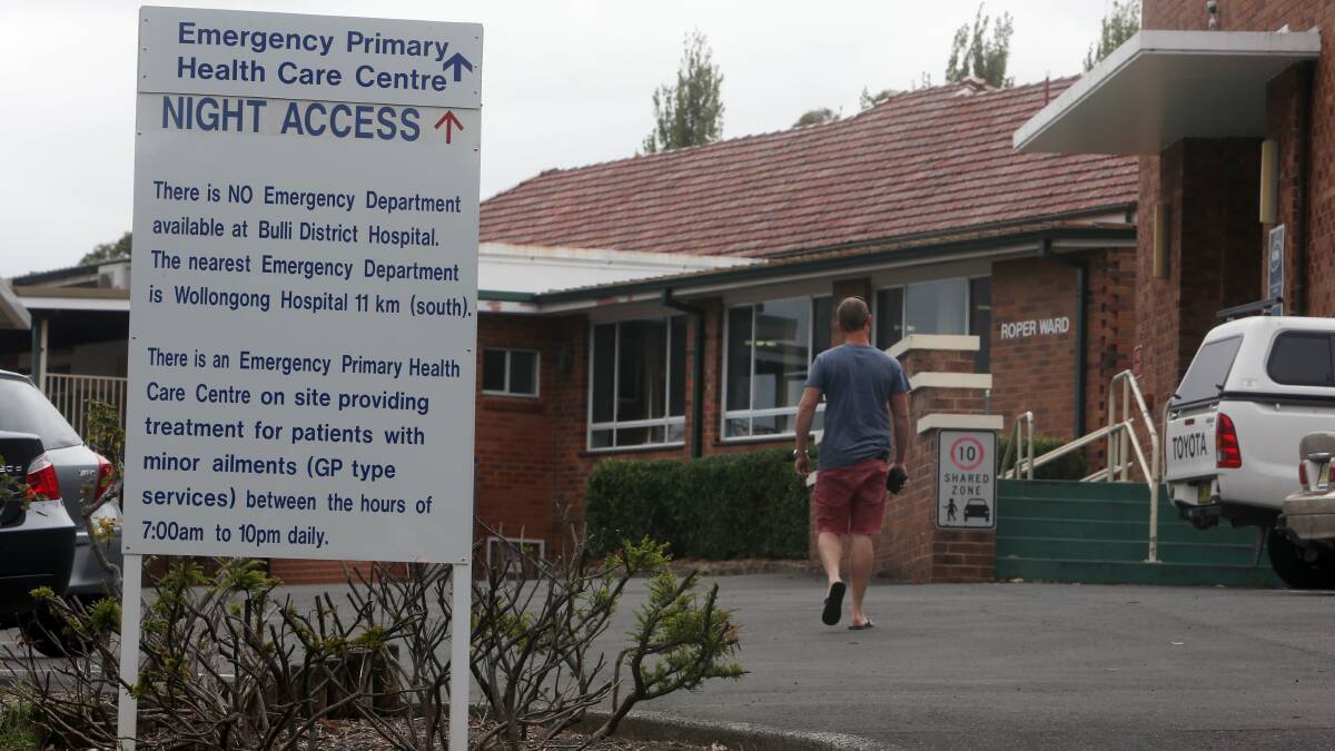 A sign was erected after Bulli Hospital's ED was closed in late 2012. Picture: Robert Peet