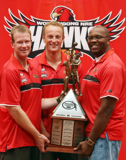 Title trio: Mat Campbell, Glen Saville and Melvin Thomas with 2001 NBL championship trophy.