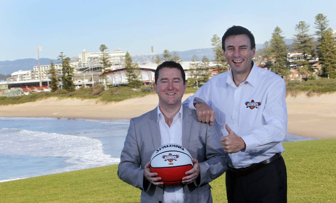 BRIEF: Telco millionaire James Spenceley, pictured with with Hawks Chairman Peter Bahlmann in 2014, had a short stint as owner of the Illawarra club. Picture: Andy Zakeli