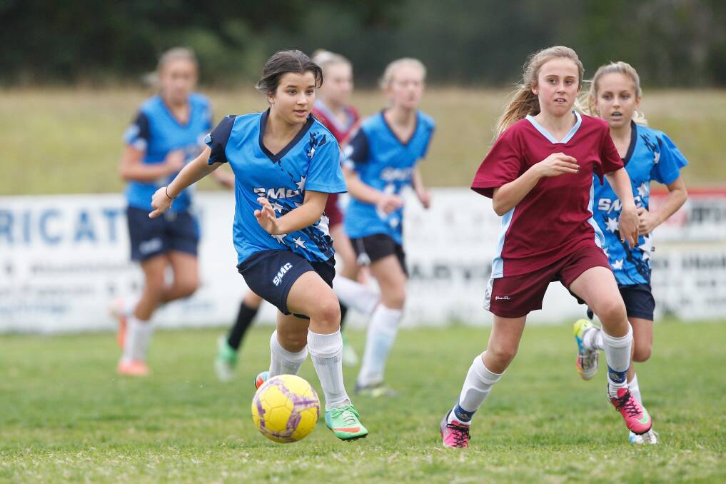 On the run: St Mary's Jenna Toscan during the 2014 Bill Turner Trophy. 