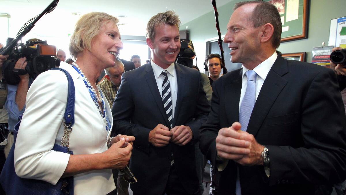 Cate McGregor, Brett Lee and then Prime Minister Tony Abbott at the Prime Minister's XI launch at Manuka Oval. Picture: Alex Ellinghausen