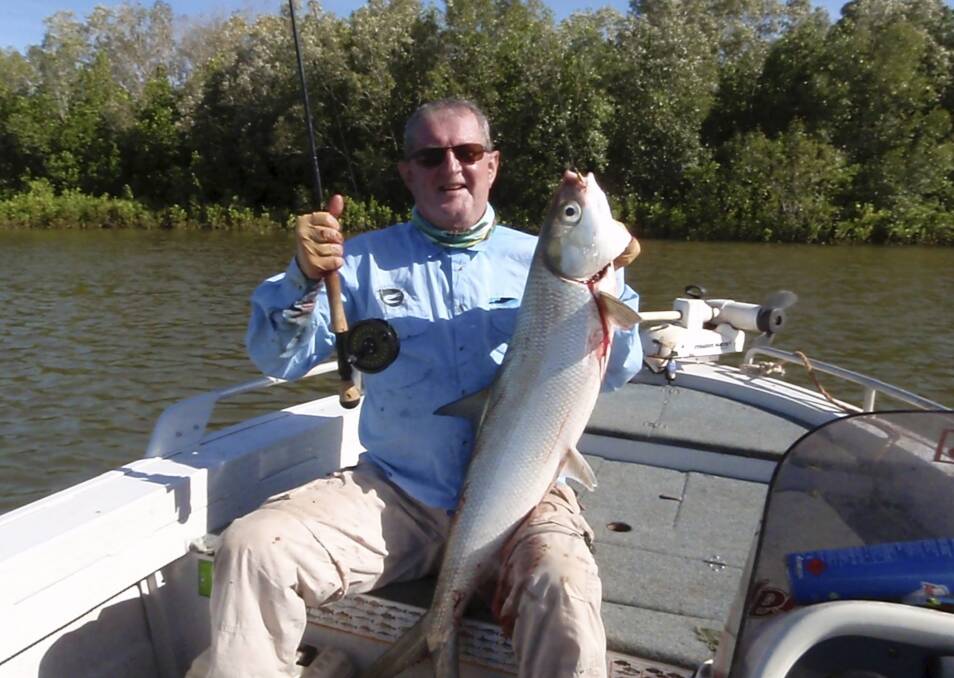 AGAINST LOCKOUTS: Fishing columnist Gary Wade with a milkfish caught in the Northern Territory. 
