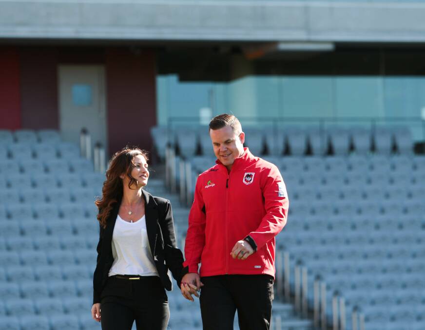 LAST CALL: Dan Hunt with wife Nadeen as he announced his retirement in 2015. Picture: Adam McLean 
