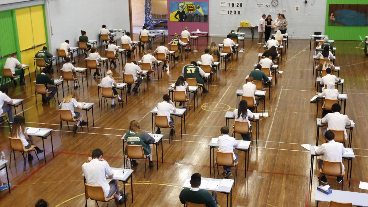 EXAM TIME: Students doing a HSC English exam. This year's written HSC exams start on October 17. Picture: Anna Warr