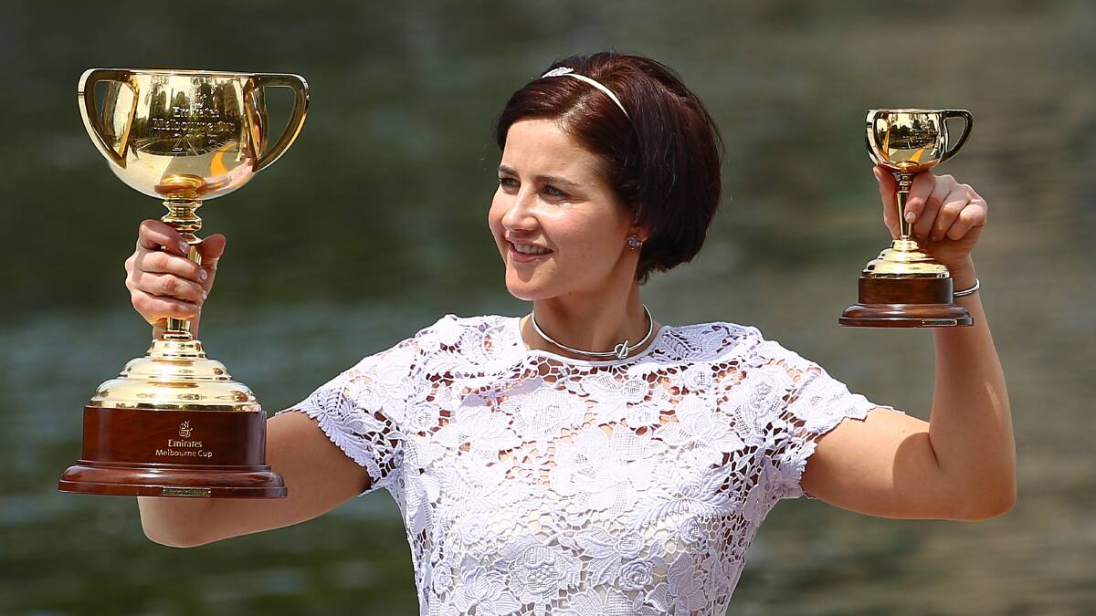Cup success: Michelle Payne with the 2015 Melbourne Cup trophies. Picture: Scott Barbour/Getty Images