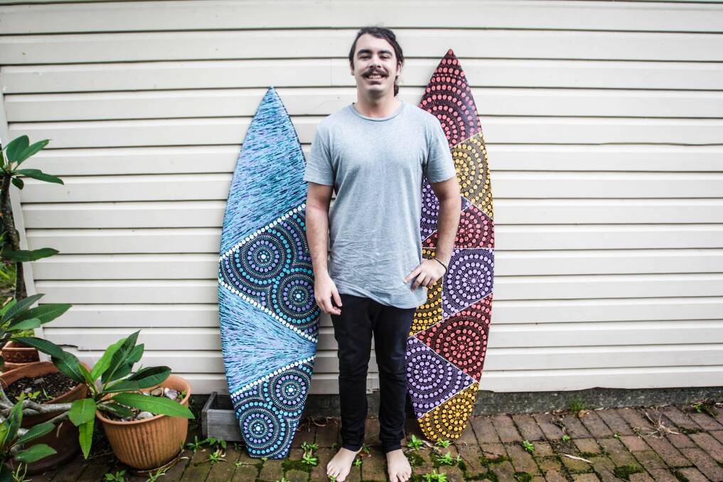 Zac Bennett-Brook with some of his artwork in 2016. Picture: Georgia Matts