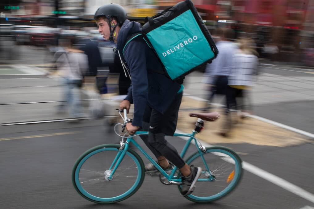 The Transport Workers Union claims Deliveroo and other delivery company riders are paid below minimum rates. Picture: Jason South
