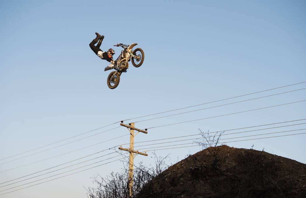 COMING UP FOR AIR: Australian Freestyle Moto X rider Luke McNeill at his training compound in greater Sydney. Picture: James Brickwood