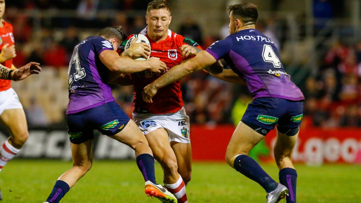 Breaking through: Tariq Sims will aim to get one over his Origin rivals against the Sharks on Friday night. Picture: Adam McLean. 