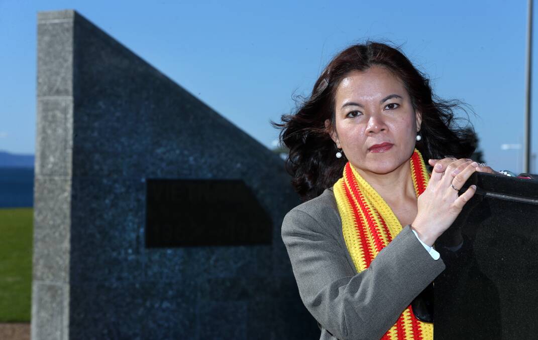REMEMBER THEM: Teresa Tran at the Vietnam Veterans Memorial at Flagstaff Hill, where the ceremony will be held on Saturday.
