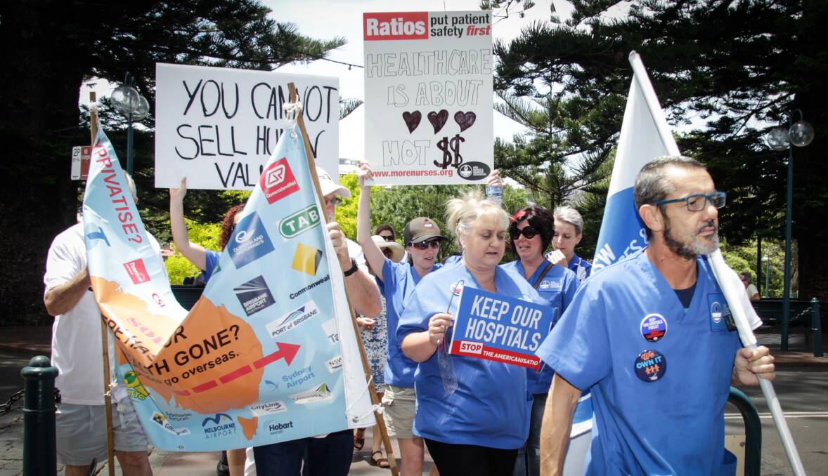 Protest: Hospital staff rallied against plans to part-privatise Shellharbour Hospital outside the Kiama office of Parliamentary Secretary for the Illawarra Gareth Ward on Friday afternoon. Picture: Georgia Matts 