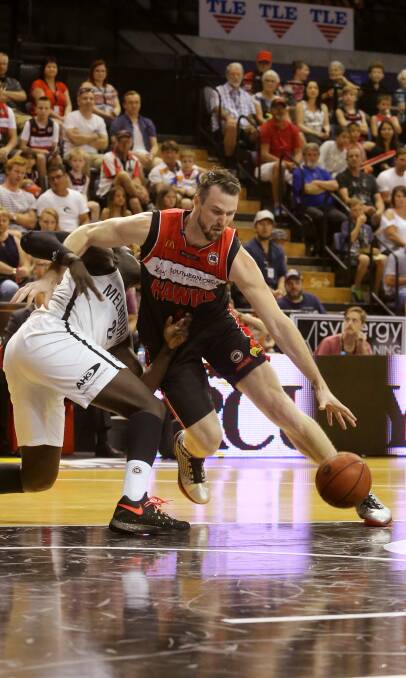 GO TO WORK: Hawks centre AJ Ogilvy was at his brilliant best in Saturday's victory over Melbourne United at WIN Entertainment Centre. Picture: ROBERT PEET