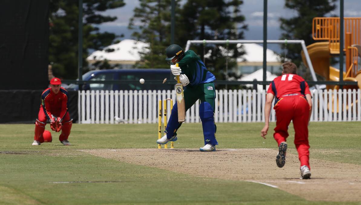 GONE: South Australian bowler Alex Garlick dismisses East Asia Pacific's Nalin Nipiko at King George Oval on Sunday. Picture: ROBERT PEET